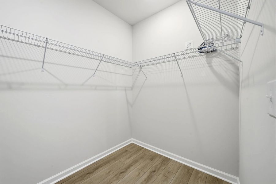 Primary Walk-in Closet Primary Walk-in Closet