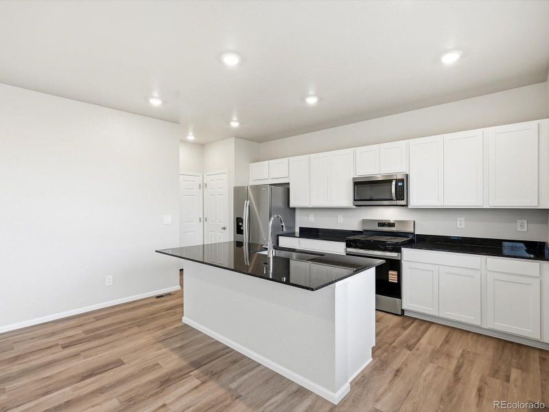 Furnished interior view inside a new home in , Commerce City (Image 7).