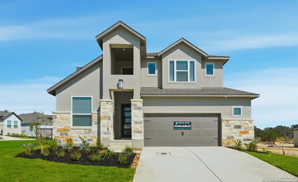 Front exterior of a new home in Esperanza – New Phase Now Selling, Boerne, TX, highlighting curb appeal (Image 2). Front exterior of a new home in Esperanza – New Phase Now Selling, Boerne, TX, highlighting curb appeal (Image 2).