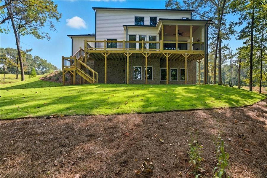 Front exterior of a new home in , Canton, GA, highlighting curb appeal (Image 1).