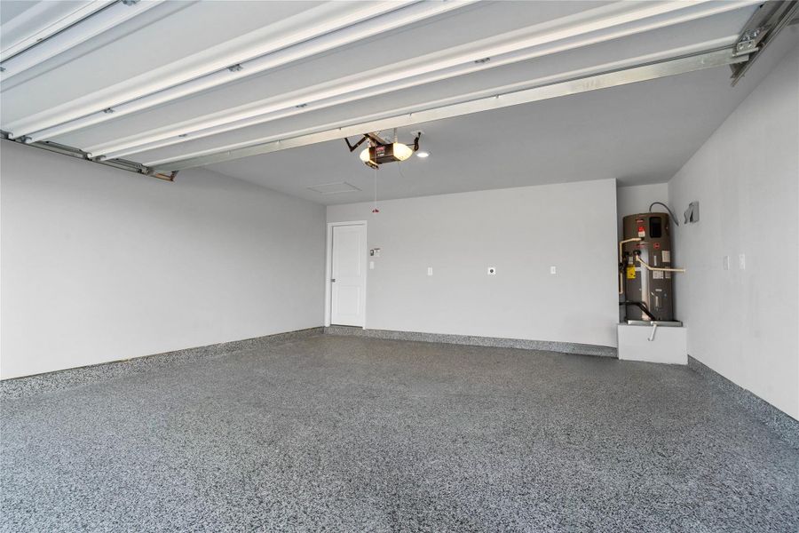 Experience the ultimate in utility with a seamless, industrial-grade concrete coating that resists stains, chemicals, and hot-tire peel. This low-maintenance, dust-free surface ensures your garage remains as impeccable as the rest of the home for years to come. Experience the ultimate in utility with a seamless, industrial-grade concrete coating that resists stains, chemicals, and hot-tire peel. This low-maintenance, dust-free surface ensures your garage remains as impeccable as the rest of the home for years to come.