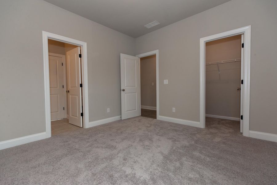 Representative unfurnished interior of a home built from the The Charleston by The Providence Group in Aberdeen, Hoschton (Image 40).