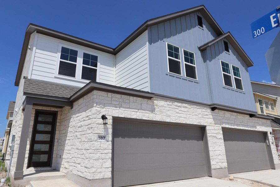 Front exterior of a new home in Union Collection at Park Central, Georgetown, TX, highlighting curb appeal (Image 1). Front exterior of a new home in Union Collection at Park Central, Georgetown, TX, highlighting curb appeal (Image 1).