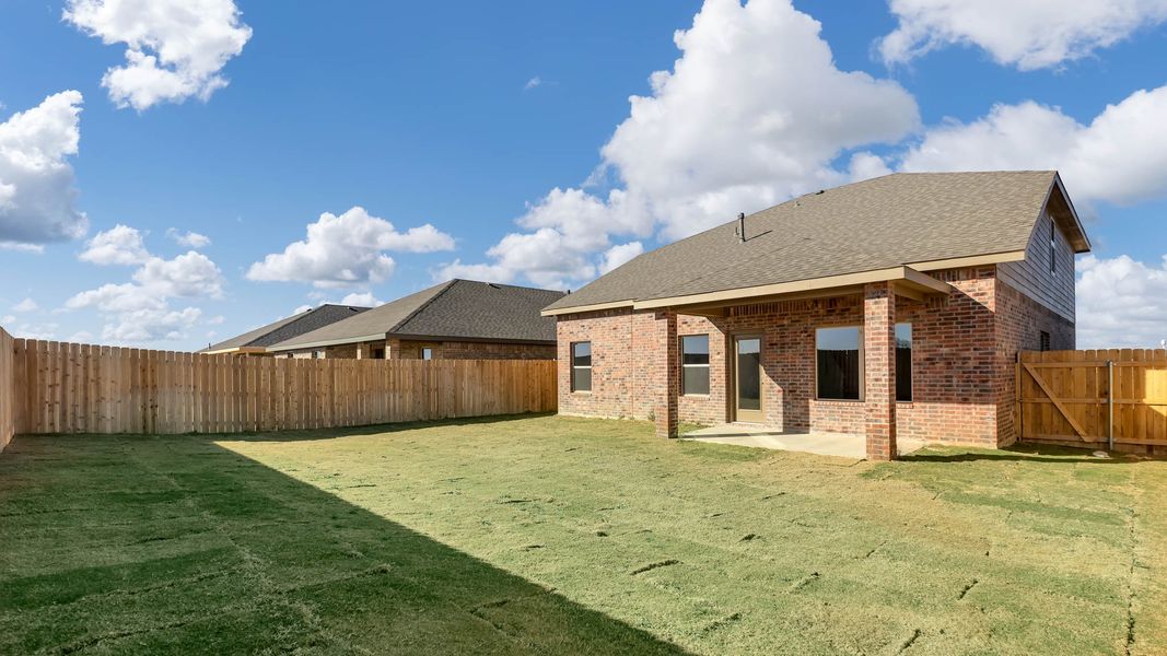 Exterior details and patio area of a home in Overlook West, Wolfforth (Image 4).