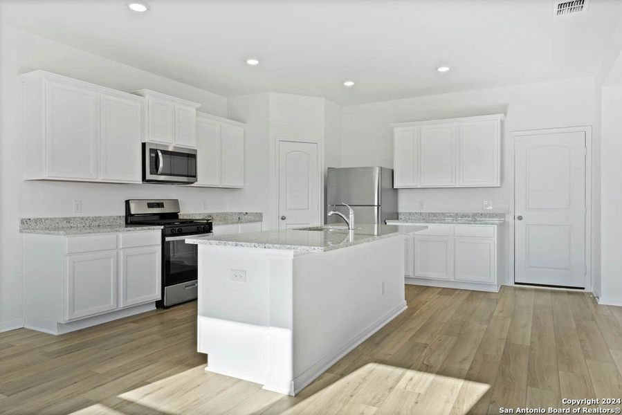 Furnished interior view inside a new home in Savannah Place, San Antonio (Image 3).