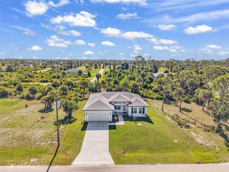 Front exterior of a new home in , Placida, FL, highlighting curb appeal (Image 26).