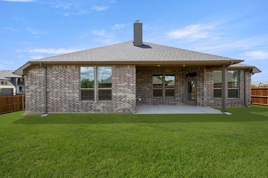 Exterior details and patio area of a home in Mockingbird Hills - Signature Series, Joshua (Image 4).
