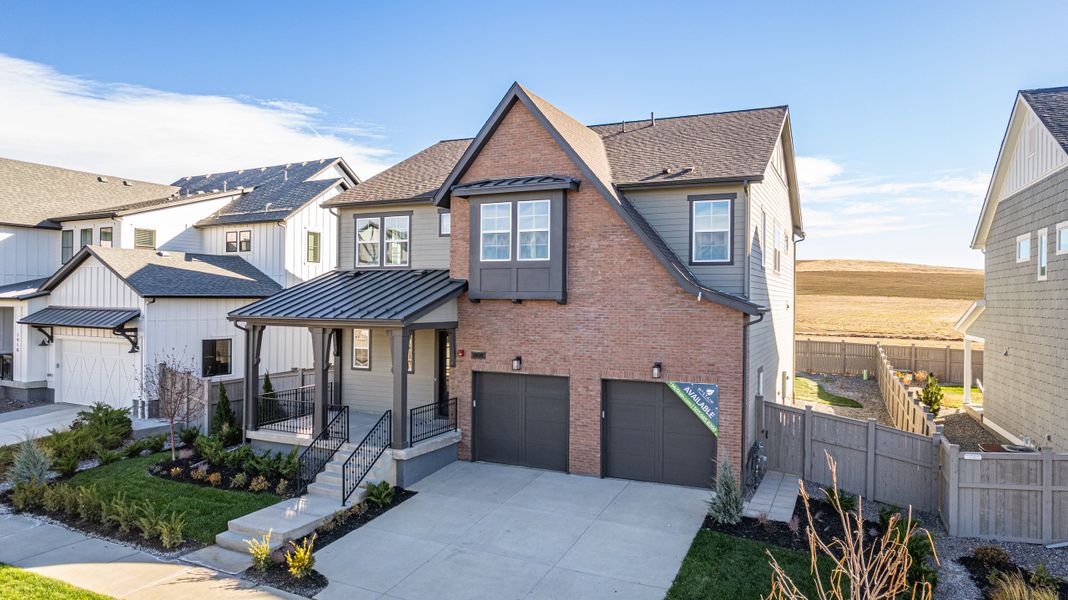 Front exterior of a new home in Westerly, Erie, CO, highlighting curb appeal (Image 2). Front exterior of a new home in Westerly, Erie, CO, highlighting curb appeal (Image 2).