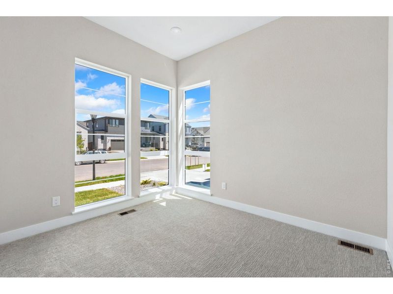 Spacious, unfurnished interior of a new home in RainDance, Windsor (Image 9).