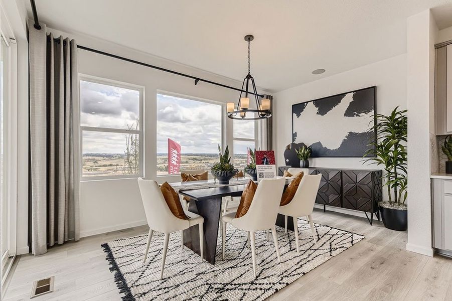 Representative furnished interior of a home built from the Ridgway by Taylor Morrison in The Fields at Looking Glass Town Collection, Parker (Image 10).
