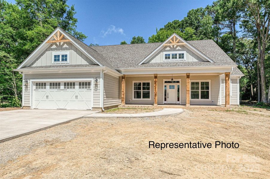 Front exterior of a new home in , Monroe, NC, highlighting curb appeal (Image 2).
