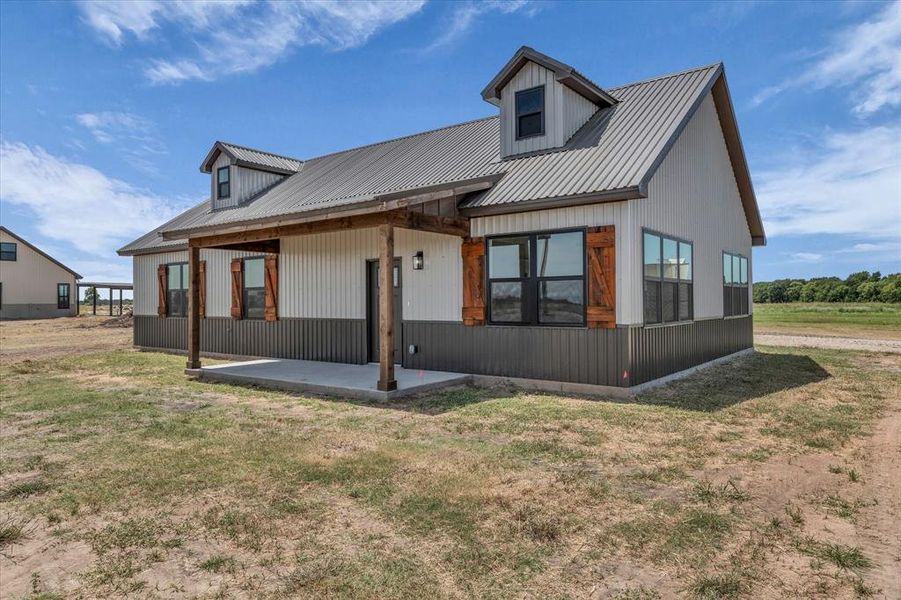Front exterior of a new home in , Elm Mott, TX, highlighting curb appeal (Image 23).