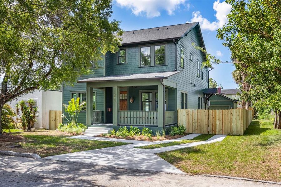 Front exterior of a new home in , Tampa, FL, highlighting curb appeal (Image 1).