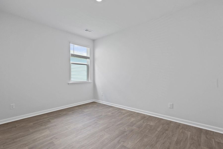 Spacious, unfurnished interior of a new home in Pine Hills at Cane Bay, Summerville (Image 12).