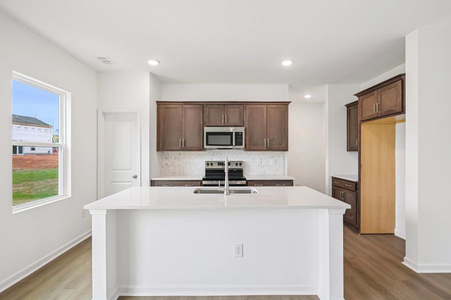 Furnished interior view inside a new home in Middleton Farms, Middlesex (Image 7). Furnished interior view inside a new home in Middleton Farms, Middlesex (Image 7).