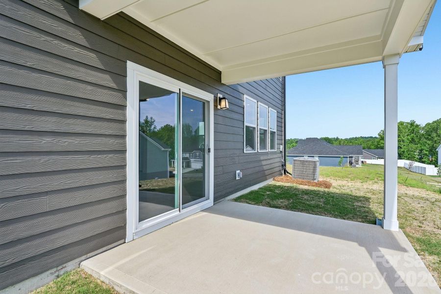 Exterior details and patio area of a home in Bella Vista Heritage, Denver (Image 4).