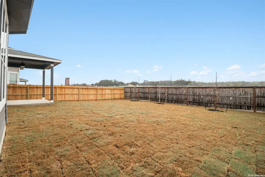 Exterior details and patio area of a home in Estancia Ranch - Classic Series, San Antonio (Image 4).