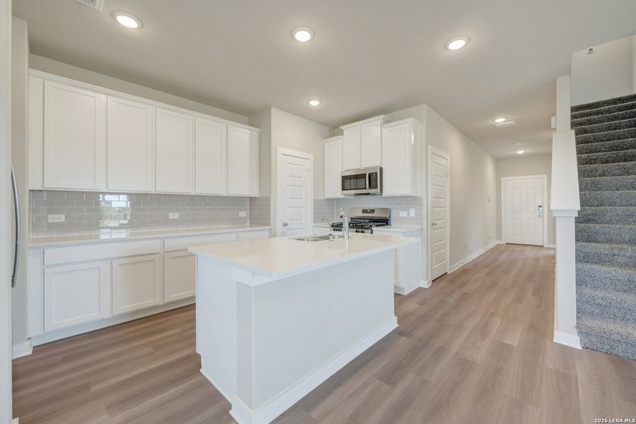 Furnished interior view inside a new home in Mesquite Ridge, San Antonio (Image 6). Furnished interior view inside a new home in Mesquite Ridge, San Antonio (Image 6).