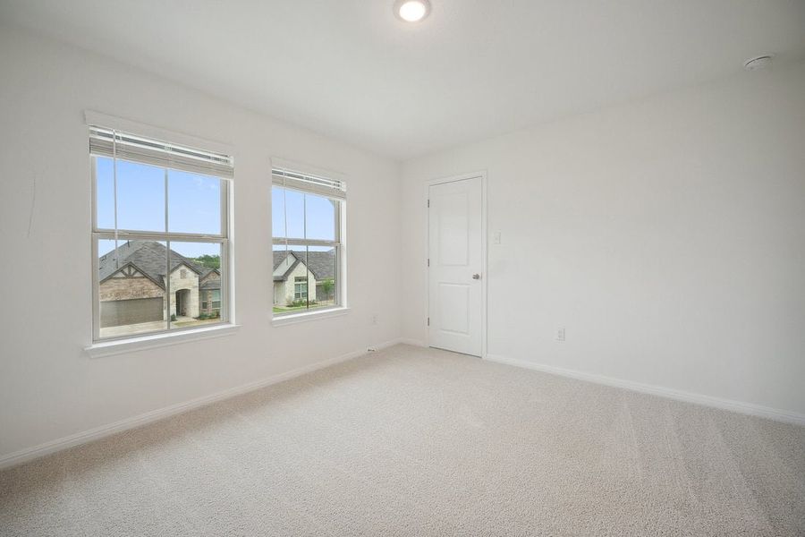 Spacious, unfurnished interior of a new home in The Hills of Bear Creek, Manchaca (Image 32).