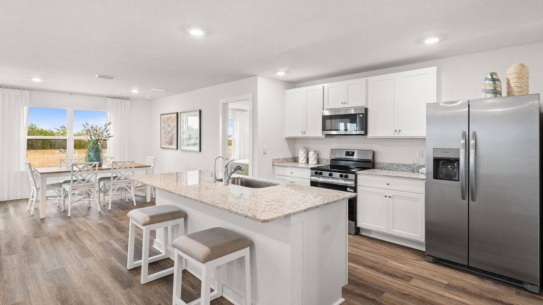 Furnished interior view inside a new home in Magnolia at the Bluffs Phase 3, Freeport (Image 7).