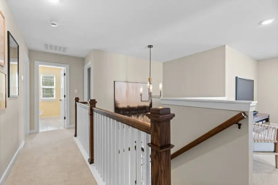 Representative furnished interior of a home built from the The Waverunner by Chesapeake Homes in Coastal Club of the Carolinas, Calabash (Image 48).