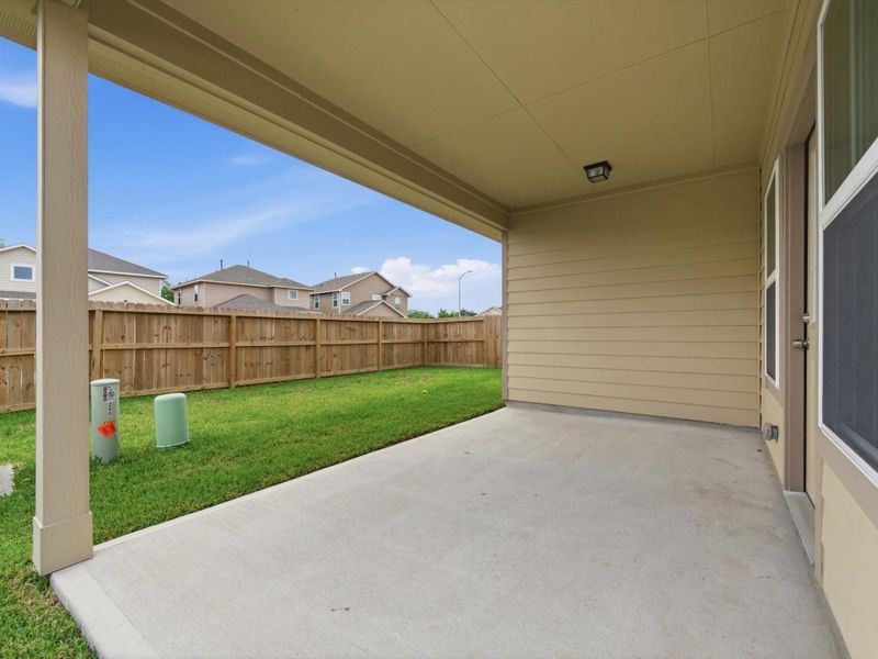 Enjoy outdoor living with a covered back patio that extends your living space and creates the perfect setting for relaxing or entertaining. Enjoy outdoor living with a covered back patio that extends your living space and creates the perfect setting for relaxing or entertaining.