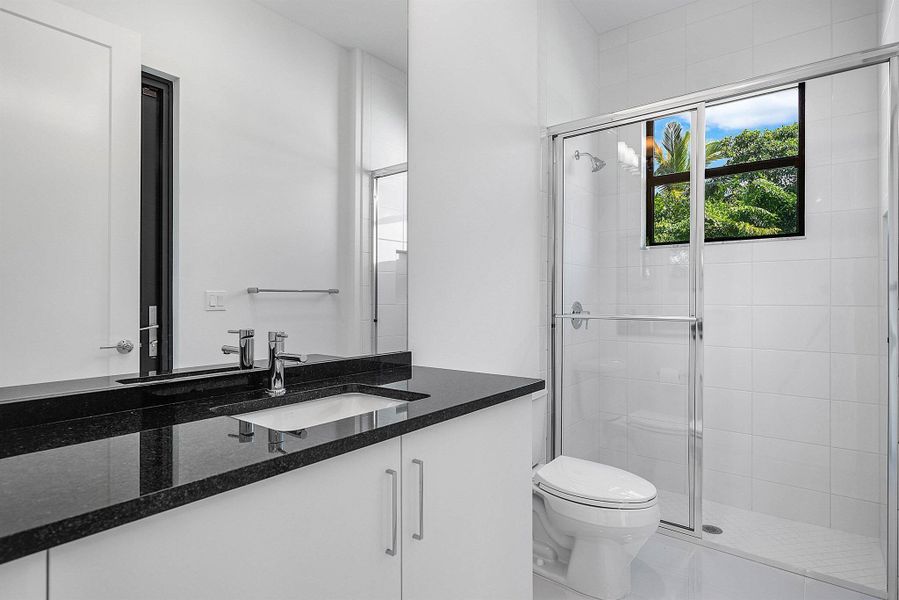 Furnished interior view inside a new home in Lotus Edge, Boca Raton (Image 19).