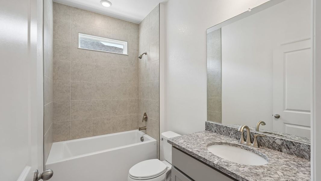 Furnished interior view inside a new home in Heritage Station, Punta Gorda (Image 12).