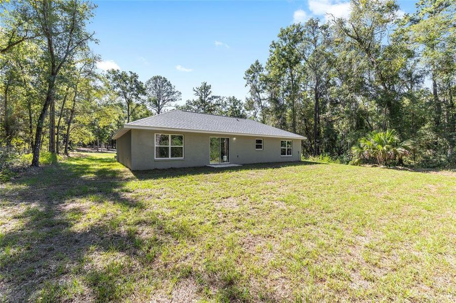 Exterior details and patio area of a home in , Citrus Springs (Image 16).