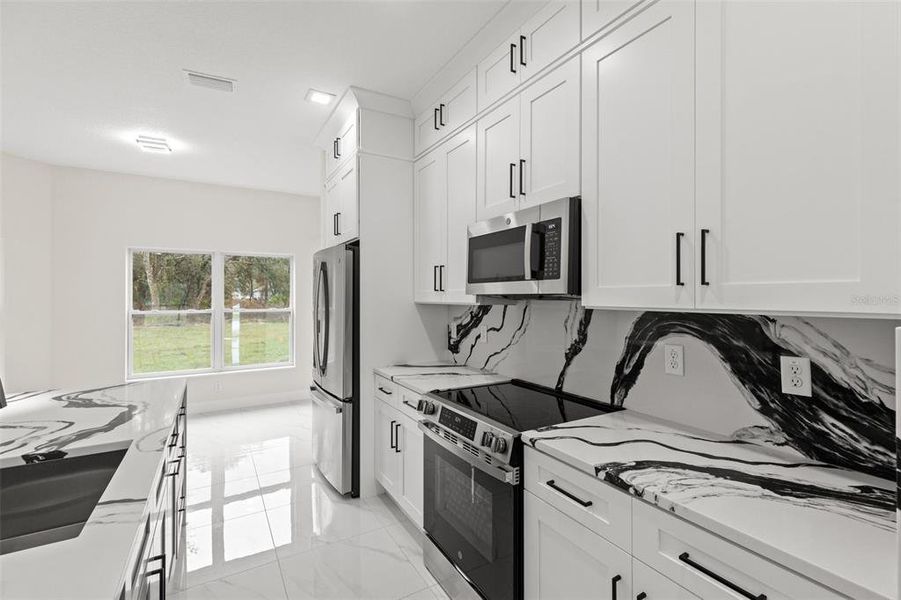 Furnished interior view inside a new home in , Weeki Wachee (Image 8).