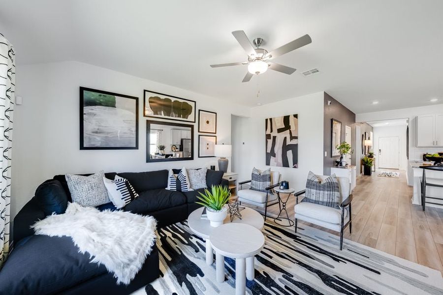 Representative furnished interior of a home built from the Finch by Taylor Morrison in Longview 50s, Del Valle (Image 7).