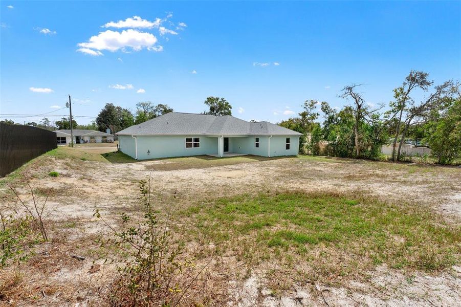 Exterior details and patio area of a home in , Spring Hill (Image 33).