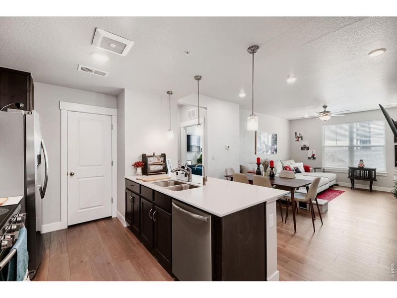 Furnished interior view inside a new home in Highlands at Fox Hill - The Flats, Longmont (Image 13).