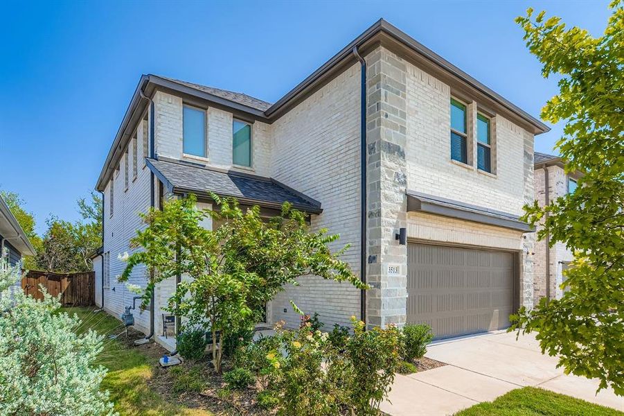 Front exterior of a new home in Lakehaven, Farmersville, TX, highlighting curb appeal (Image 18). Front exterior of a new home in Lakehaven, Farmersville, TX, highlighting curb appeal (Image 18).