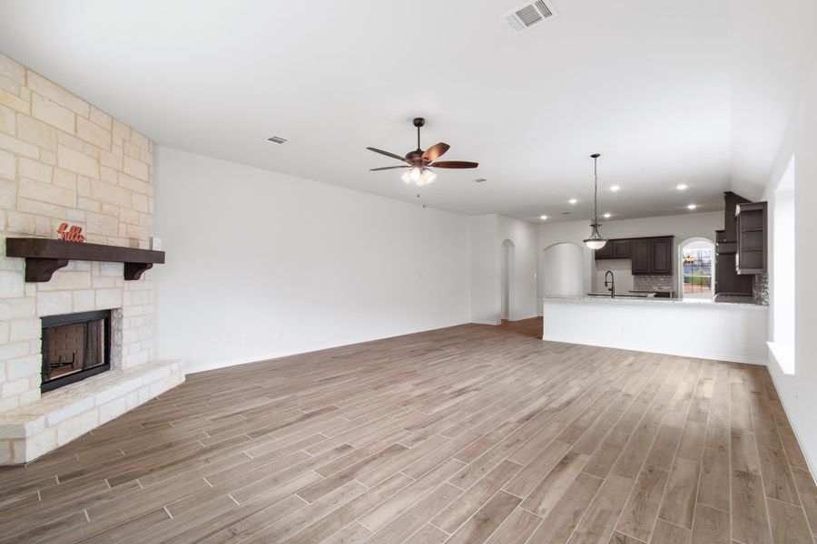 Family Room | Concept 2533 at Mockingbird Hills in Joshua, TX by Landsea Homes