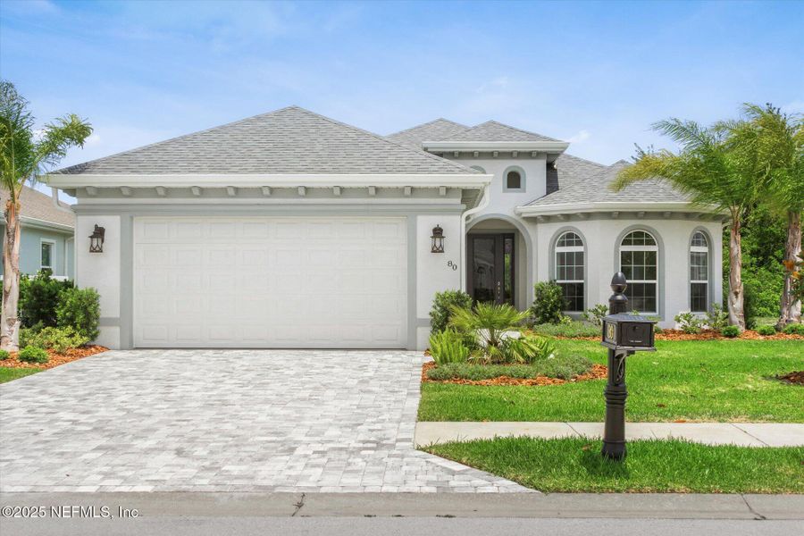 Front exterior of a new home in , Palm Coast, FL, highlighting curb appeal (Image 2). Front exterior of a new home in , Palm Coast, FL, highlighting curb appeal (Image 2).