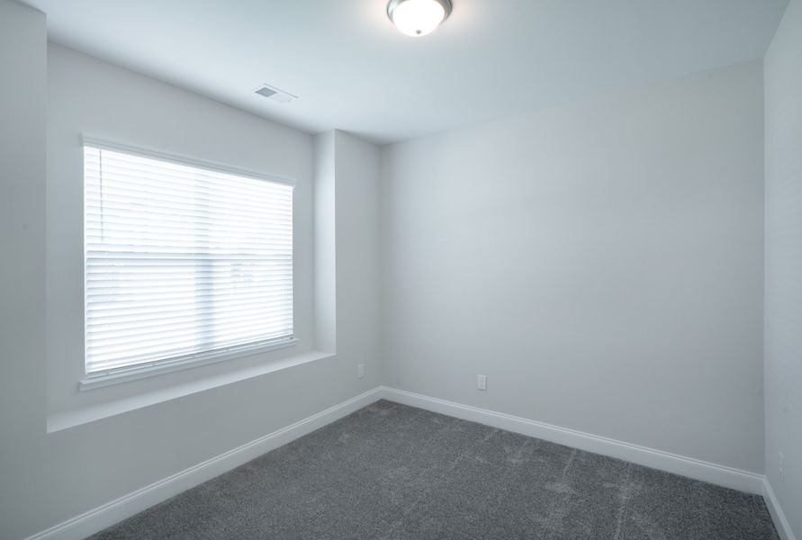 Representative unfurnished interior of a home built from the The Calle by Cothran Homes in Holly Ridge, Greenville (Image 30). Representative unfurnished interior of a home built from the The Calle by Cothran Homes in Holly Ridge, Greenville (Image 30).