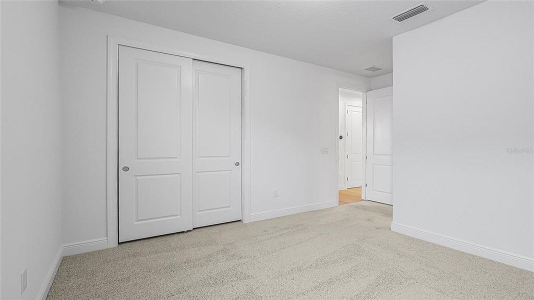 Spacious, unfurnished interior of a new home in Woodland Preserve, Parrish (Image 22).