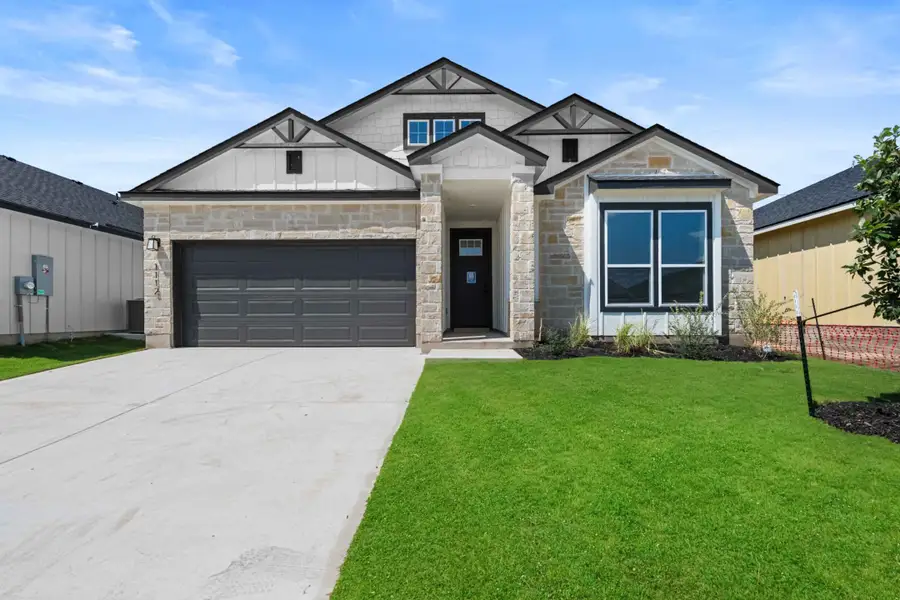 Front exterior of a new home in Oak Ridge, Temple, TX, highlighting curb appeal (Image 1). Front exterior of a new home in Oak Ridge, Temple, TX, highlighting curb appeal (Image 1).