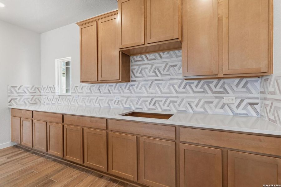 Furnished interior view inside a new home in Alamo Estates, San Antonio (Image 10).