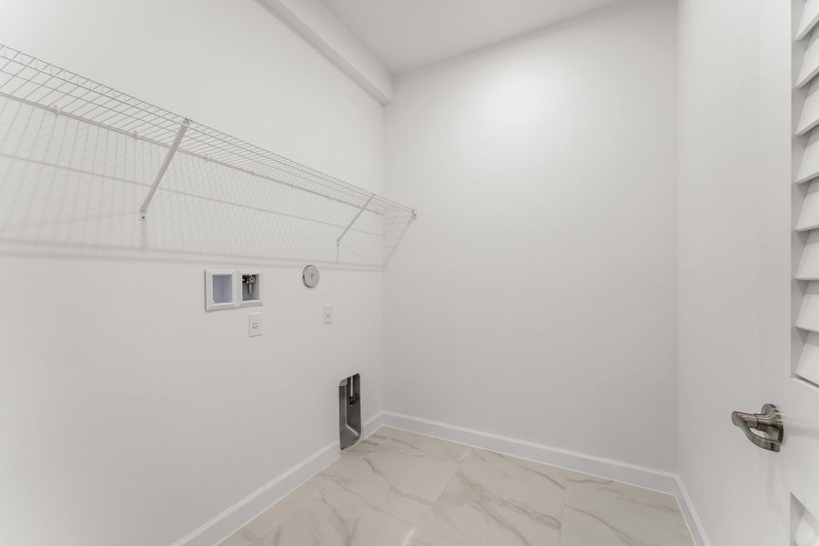 Furnished interior view inside a new home in Tradition - Cadence, Port St. Lucie (Image 7).