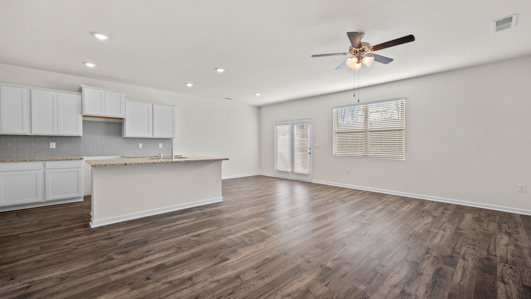 Representative unfurnished interior of a home built from the Salisbury by D.R. Horton in Inverness at Sugarloaf, Lawrenceville (Image 13).
