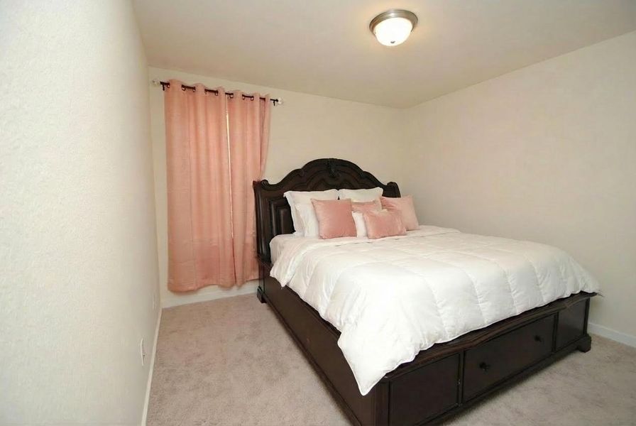 Furnished interior view inside a new home in Mason Woods, Cypress (Image 16).