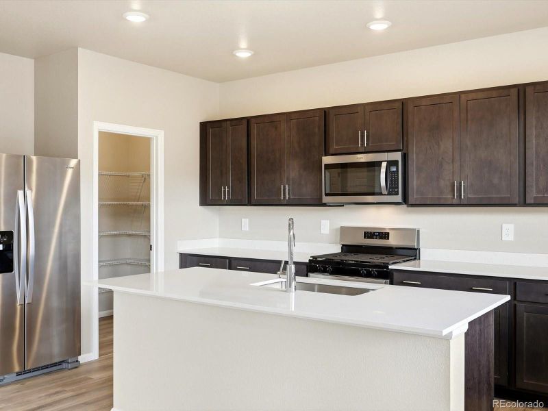Furnished interior view inside a new home in Revere at Johnstown, Johnstown (Image 9).