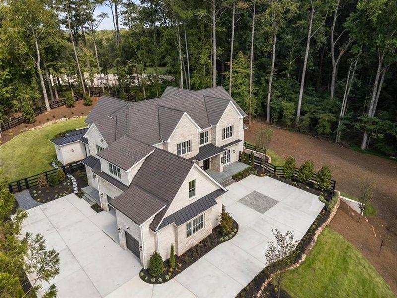 Front exterior of a new home in , Milton, GA, highlighting curb appeal (Image 27). Front exterior of a new home in , Milton, GA, highlighting curb appeal (Image 27).
