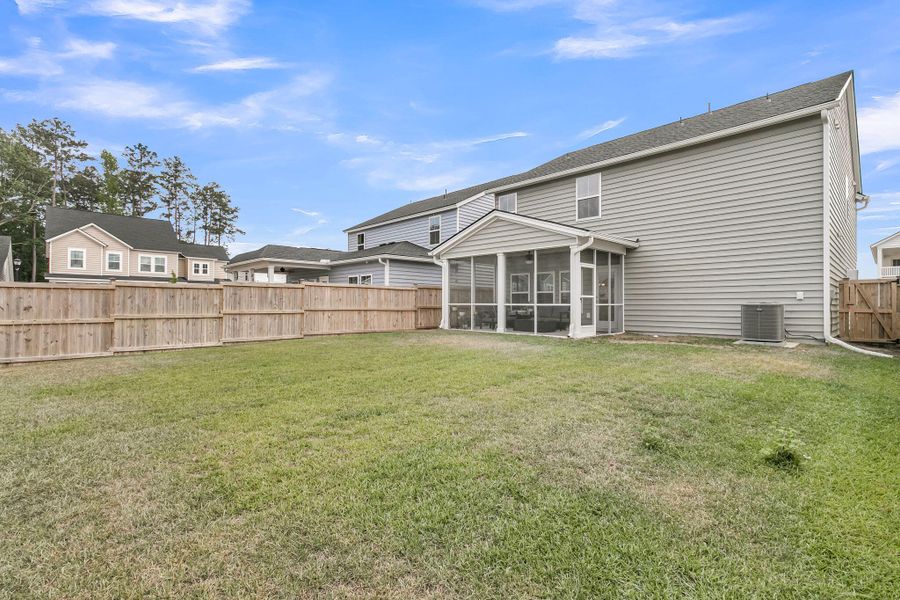 Exterior details and patio area of a home in Sweetgrass at Summers Corner, Summerville (Image 25).
