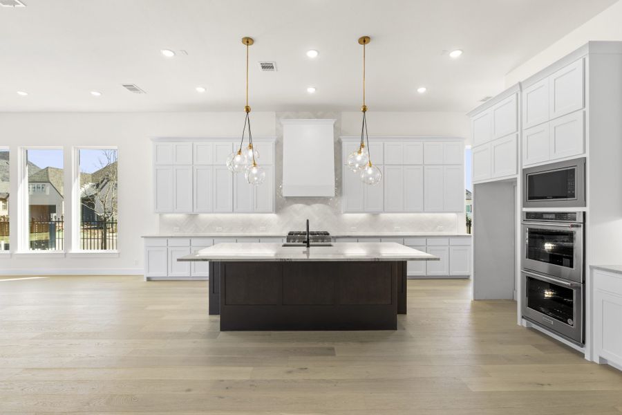 Representative furnished interior of a home built from the 5551 by Tradition Homes in Windsong Ranch, Prosper (Image 6).