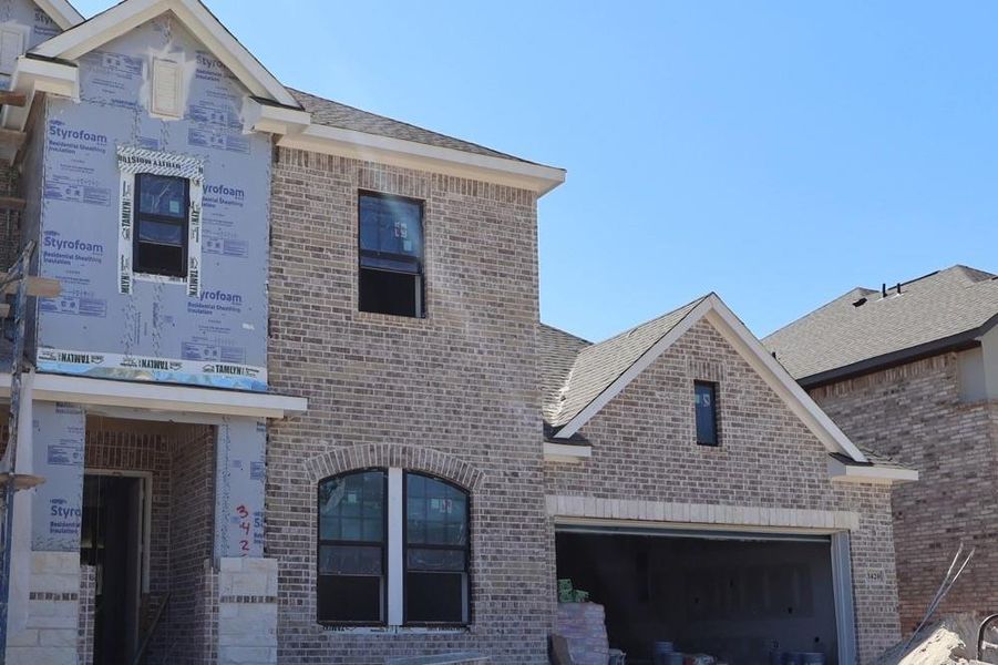 Exterior details and patio area of a home in The Meadows at Imperial Oaks, Conroe (Image 3). Exterior details and patio area of a home in The Meadows at Imperial Oaks, Conroe (Image 3).