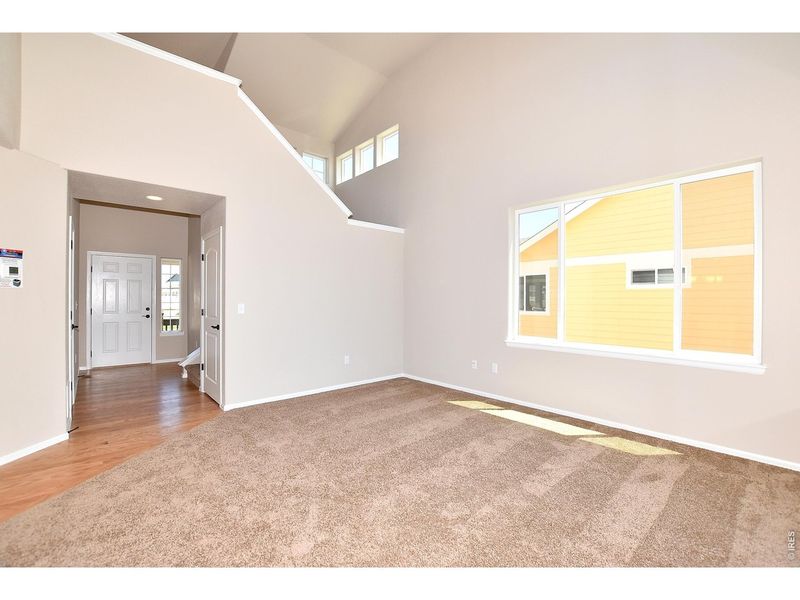Spacious, unfurnished interior of a new home in Union Colony West, Greeley (Image 32).