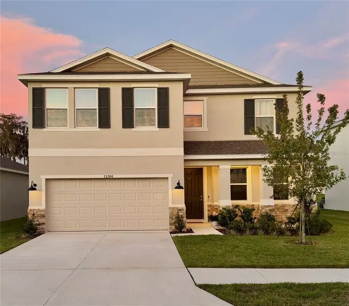 Front exterior of a new home in , San Antonio, FL, highlighting curb appeal (Image 26). Front exterior of a new home in , San Antonio, FL, highlighting curb appeal (Image 26).